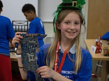 Georgian Heights student with technology